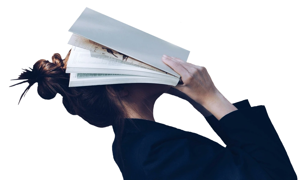 International student with book - study abroad wellbeing support